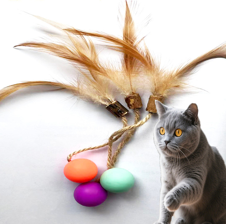 Pelota elástica de silicona colorida transnacional con plumas: Artefacto mágico para gatos con cuerda de cáñamo de matatabi para entretenimiento propio de los gatos
